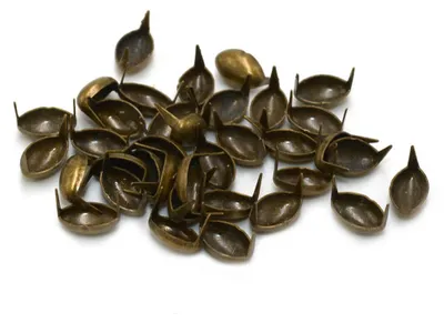 Produktbild von Vintageparts Metallnieten bronzefarben oval 100 Stück 8x5mm Splintnieten
