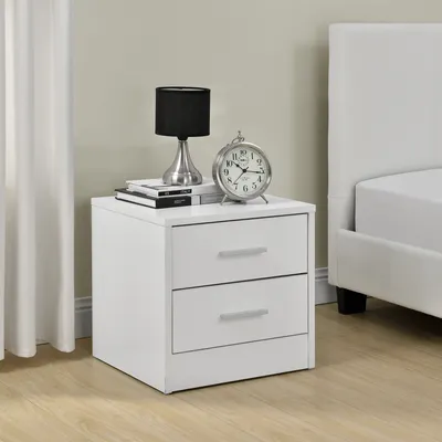 A white nightstand with two drawers is shown next to a bed.