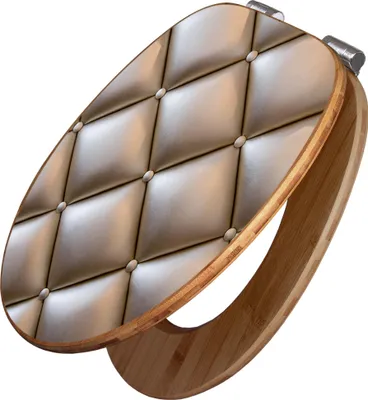 A toilet seat with a tufted bronze upholstered lid and a bamboo base.