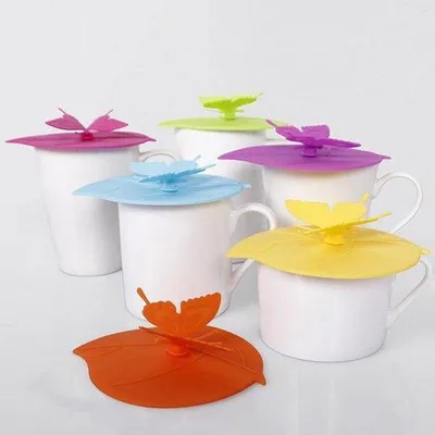 Imagen del producto de Ibenzoa® Juego de 6 tapas de silicona para vasos, forma de mariposa: aptas para alimentos, reutilizables, de varios colores, herméticas y a prueba de salpicaduras, para tazas y vasos