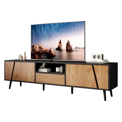 A modern TV stand with a large television on top, set against a white background.