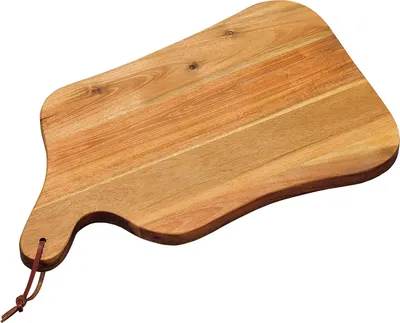 A wooden cutting board with a handle and a leather strap, isolated on a white background.