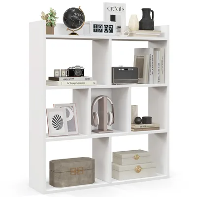 A white geometric bookshelf with various decorative items and books on its shelves.