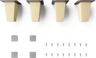 Four wooden furniture legs and accompanying hardware are displayed against a white background.