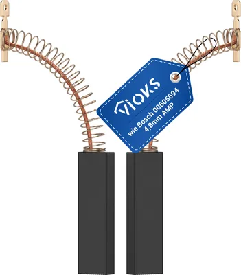 Two carbon brushes with copper springs and a blue tag attached to one of the springs.