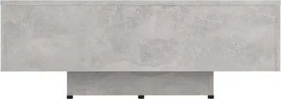 A top-down view of a rectangular coffee table with a concrete-like finish.