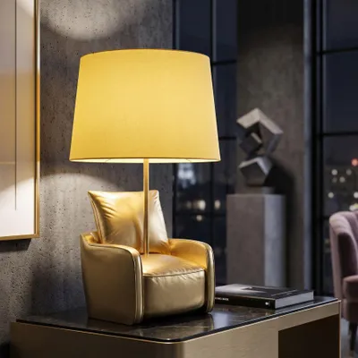 Obrázok produktu pre Stolová lampa kreslo zo zlatej živice ø 26x46 cm