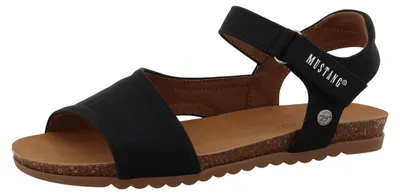 Das Bild zeigt einen schwarzen Schuh mit einer modernen und sportlichen Silhouette. Der Schuh ist von der Seite zu sehen und hebt seine glatte Oberfläche und die dynamische Form hervor.