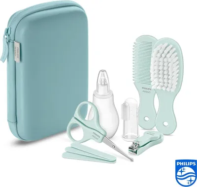 Produktbild von Essentielle Babypflege-Set - 9 Zubehörteile Nagelknipser Schere 3 Nagelfeilen Kamm Haarbürste Nasensauger und Fingerzahnbürste (Modell SCH401/00)
