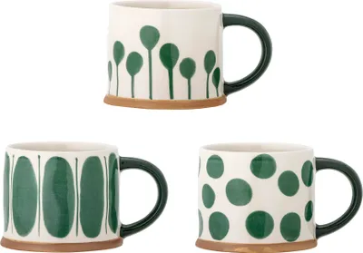 Three ceramic mugs with green patterns on a white background.