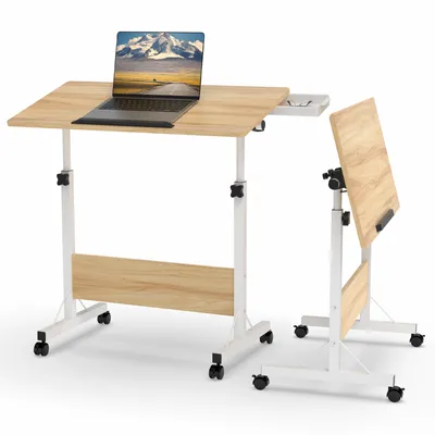 Two adjustable height laptop tables with wooden tops and white metal frames are shown against a white background. One table has a laptop on it, and the other is folded and positioned next to it.
