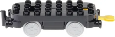 A black toy train car with gray wheels and a yellow coupling.