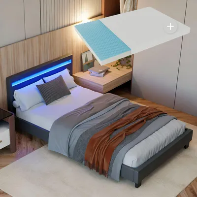 A bedroom scene with a bed and a mattress overlay.