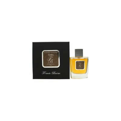 A perfume bottle and its box are displayed on a white background.