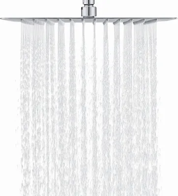 A close-up shot of a square shower head with water flowing out of it.