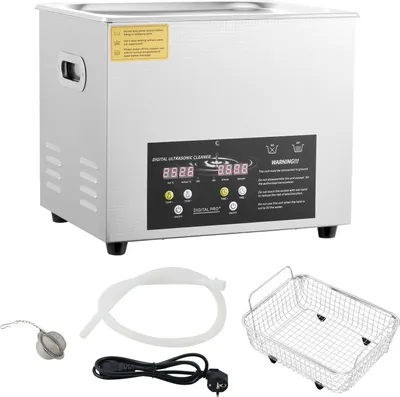 A digital ultrasonic cleaner and its accessories are displayed against a white background.