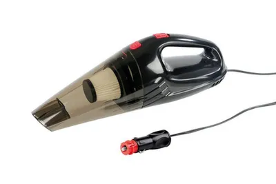 A black and gray handheld car vacuum cleaner with a red power button and a car charger plug is shown against a white background.