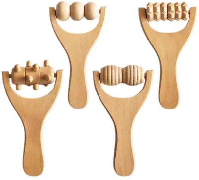 Immagine prodotto di Rulli massaggianti in legno - Set da massaggio - 4 pezzi - per schiena, collo, spalle, viso, piedi e corpo