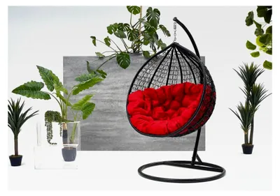 Produktbild von Hängesessel aus Polyrattan mit Gestell und roten Kissen für den Außenbereich