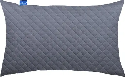 A gray quilted pillow.