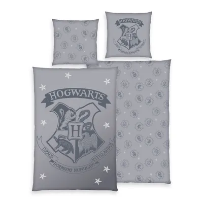 A collection of Harry Potter themed bedding items, including pillowcases and a duvet cover, laid out on a white background.