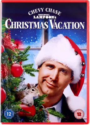 The cover art for the movie 'National Lampoon's Christmas Vacation' featuring Chevy Chase in a Santa hat.