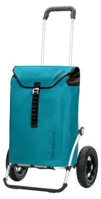 A teal shopping trolley with large wheels, shown against a white background.