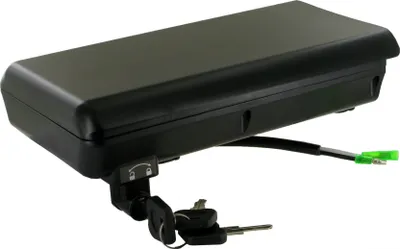 A black battery pack with two keys attached to a lock mechanism.