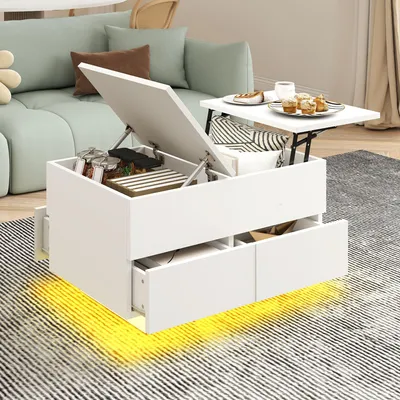 A modern white coffee table with a lift-top and drawers, placed on a rug in a living room setting with a sofa in the background.