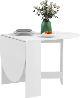 A white oval dining table with one leaf folded down.