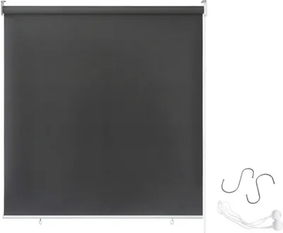 A dark grey roller blind is shown against a white background, with some accessories on the right side.