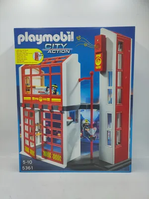 The image shows the packaging of a Playmobil fire station playset.