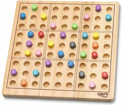 A wooden Sudoku board game with colorful numbered pegs.