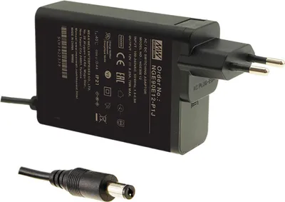 A black AC/DC switching adapter with a European plug and a separate DC barrel connector.