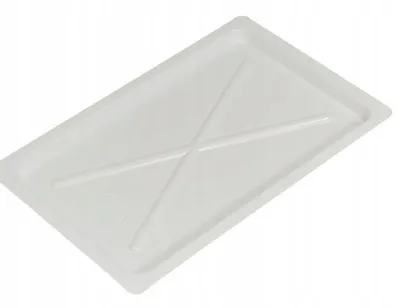 A white plastic tray with a cross-shaped reinforcement pattern on its surface, shown from a slightly elevated angle.