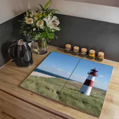 Produktbild von banjado Herdabdeckplatte zweiteilig je 30x52cm groß mit Gummi Abstandshalter, ESG Sicherheitsglas mit Motiv Leuchtturm [HAP2 10082]