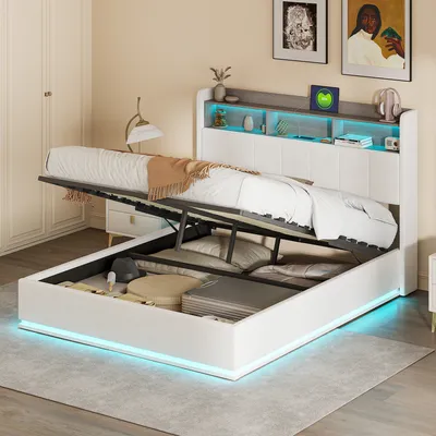 A bedroom scene with a bed that has its storage compartment open, revealing stored items. The bed has LED lighting.