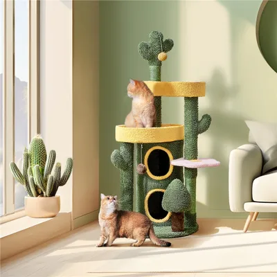 Two cats interacting with a cactus-themed cat tree in a sunlit room.