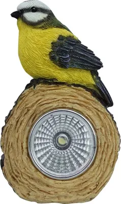 A decorative solar light shaped like a bird sitting on a log.