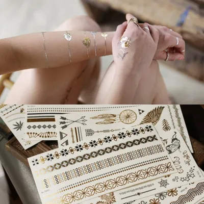 Produktbild von Festival Tattoos Gold Temporäre Tattoos Halloween Tattoos Metallic Tattoo Wasserdicht 6 Blätter 70 Mustern Glitzer Tattoo Silber für Frauen Jugendliche Mädchen Festival Party Accessoire