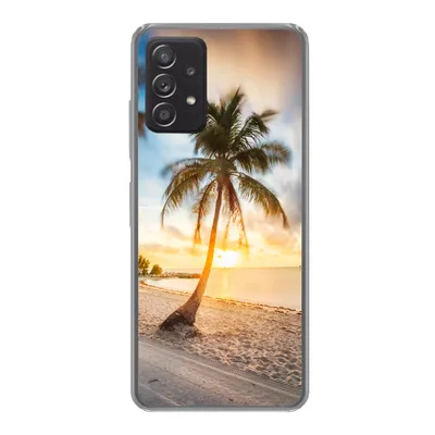 A phone case with a sunset and palm tree image on a white background.