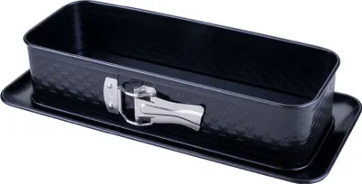 A black rectangular baking pan with a silver clasp sits on a black rectangular tray.