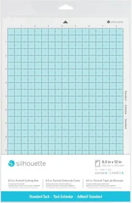 A Silhouette cutting mat with grid lines and branding.