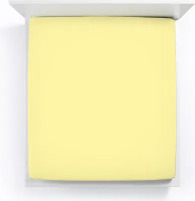 A top-down view of a light yellow fitted sheet on a bed frame.