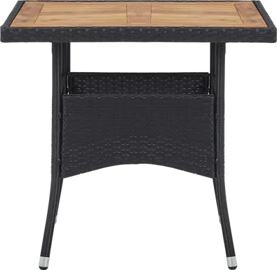 A product shot of a black poly rattan dining table with a solid acacia wood top.