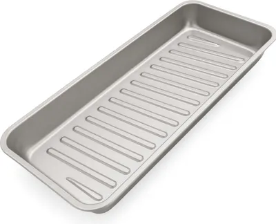 A close-up, angled view of a rectangular metal grilling tray with raised ridges on its surface, set against a plain white background.