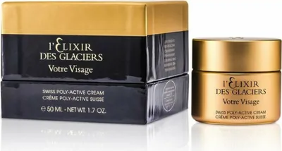 A product shot of a luxury face cream and its packaging.