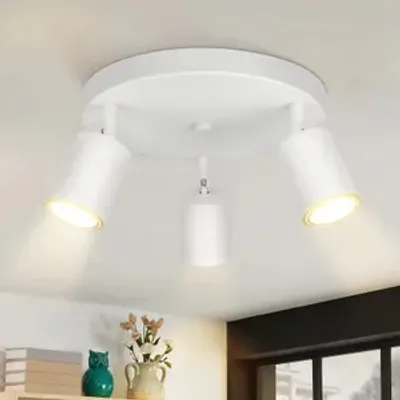 A white ceiling light fixture with three adjustable spotlights is shown against a white ceiling.