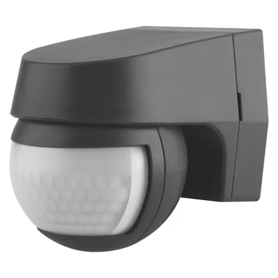 A dark gray motion sensor with a white, hexagonal patterned lens, mounted on a white background.