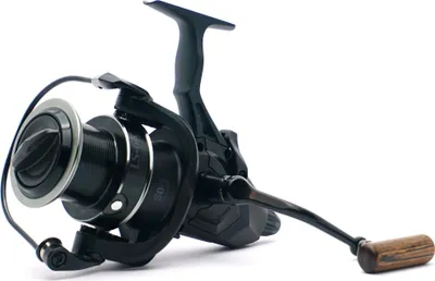 A black fishing reel with a wooden handle is shown against a white background.